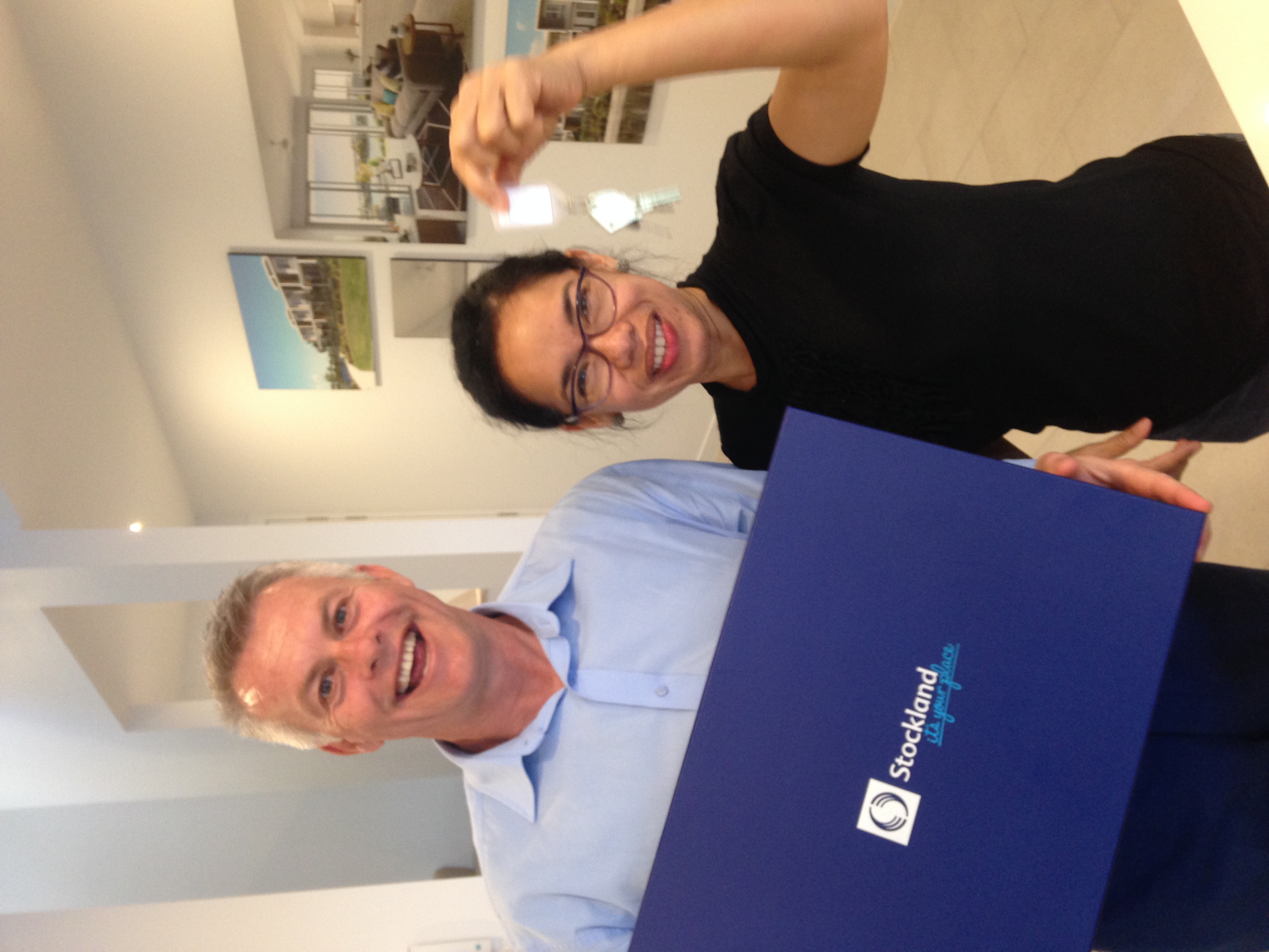 Client in front of their new build home